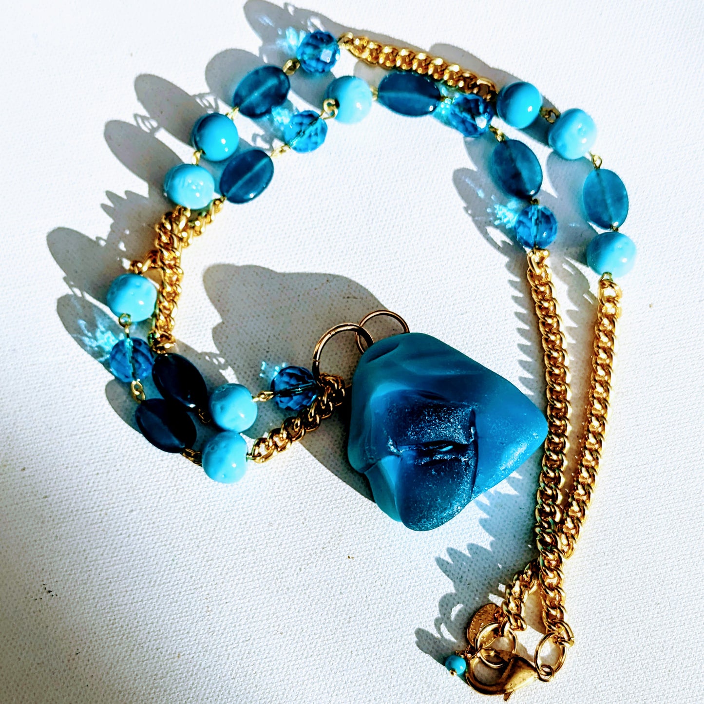 Blue Glass Beads inset into a gold chain with a glass pendant beach weddings Sugar Gay Isber necklace UNISEX